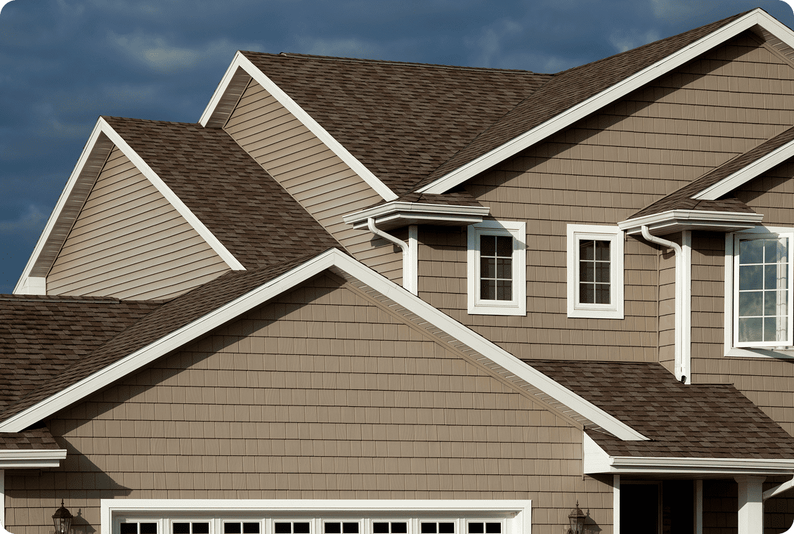 House with brown siding and white trim