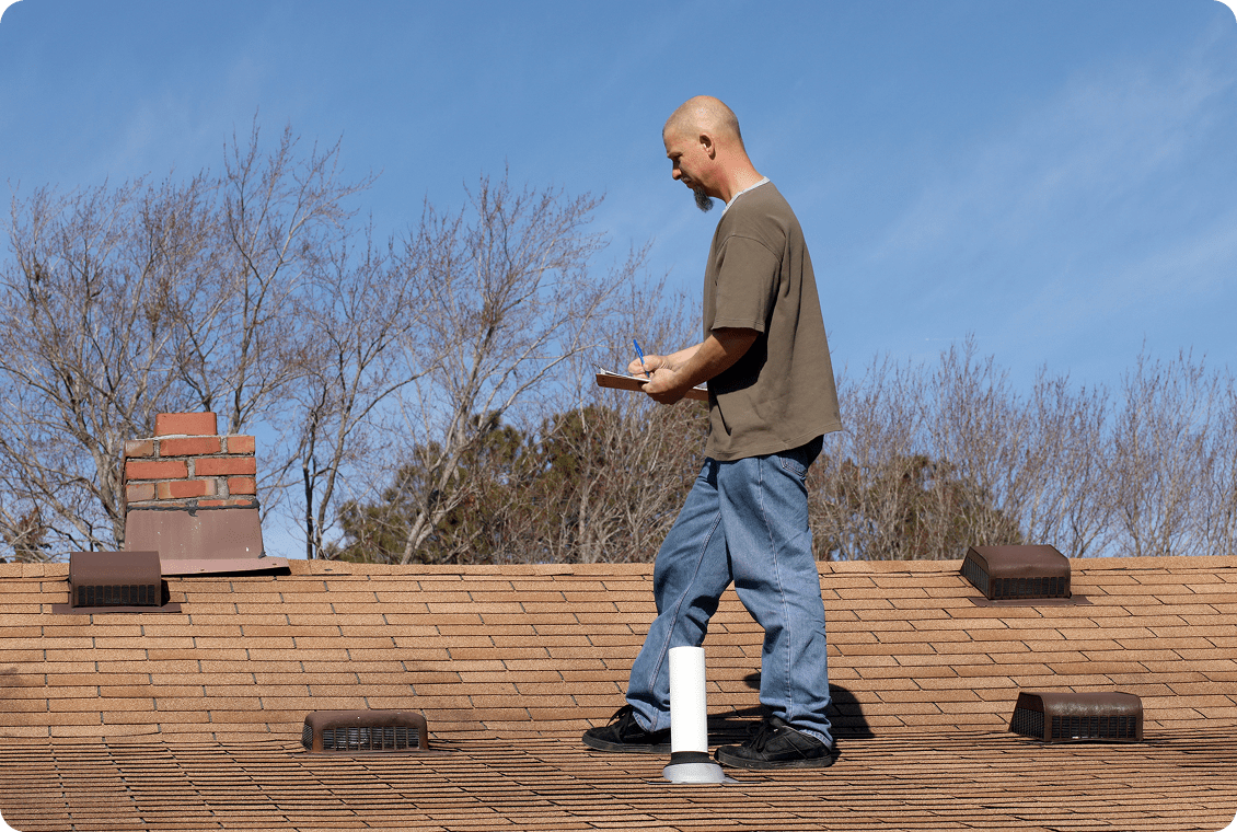Person walking on brown roof